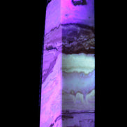Caribbean aqua blue Calcite obelisk 479g in UV light - Rocks and Things Store