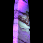 Caribbean aqua blue Calcite obelisk 479g in UV light - Rocks and Things Store