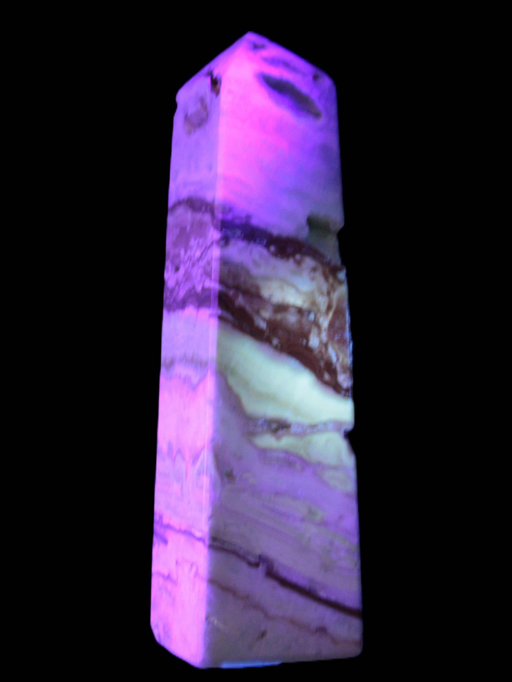 Caribbean aqua blue Calcite obelisk 479g in UV light - Rocks and Things Store