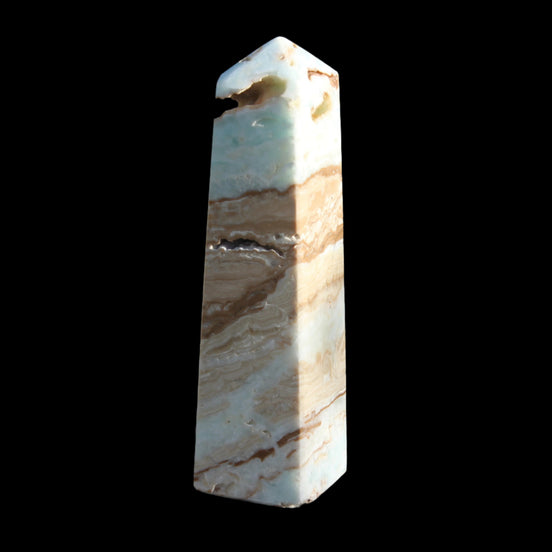 Caribbean aqua blue Calcite obelisk 479g in sunlight - Rocks and Things Store