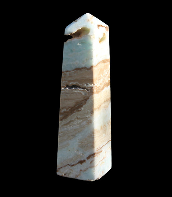 Caribbean aqua blue Calcite obelisk 479g in sunlight - Rocks and Things Store