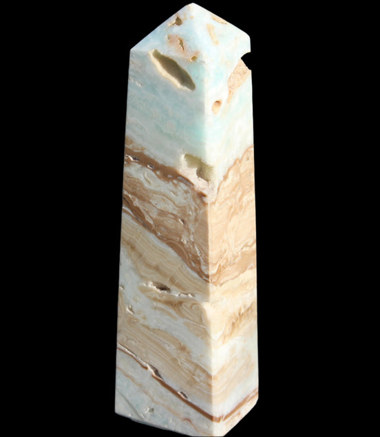 Caribbean aqua blue Calcite obelisk 479g in sunlight - Rocks and Things Store