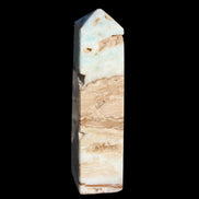 Caribbean aqua blue Calcite obelisk 479g in sunlight - Rocks and Things Store