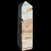 Caribbean aqua blue Calcite obelisk 479g in sunlight - Rocks and Things Store