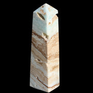 Caribbean aqua blue Calcite obelisk 479g in sunlight - Rocks and Things Store