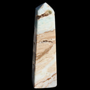Caribbean aqua blue Calcite obelisk 479g in sunlight - Rocks and Things Store