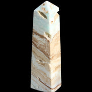 Caribbean aqua blue Calcite obelisk 479g in sunlight - Rocks and Things Store