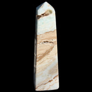 Caribbean aqua blue Calcite obelisk 479g in sunlight - Rocks and Things Store