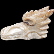 Chocolate Calcite dragon head 40*72*118mm 461g in sunlight - Rocks and Things Store