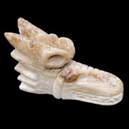 Chocolate Calcite dragon head 40*72*118mm 461g in sunlight - Rocks and Things Store