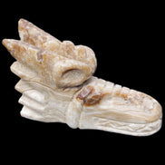 Chocolate Calcite dragon head 40*72*118mm 461g in sunlight - Rocks and Things Store