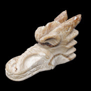 Chocolate Calcite dragon head 40*72*118mm 461g in sunlight - Rocks and Things Store