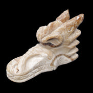 Chocolate Calcite dragon head 40*72*118mm 461g in sunlight - Rocks and Things Store