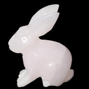 Mangano Calcite bunny 76*36*100mm 396g in sunlight - Rocks and Things Store