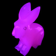 Mangano Calcite bunny 76*36*100mm 396g in UV light - Rocks and Things Store