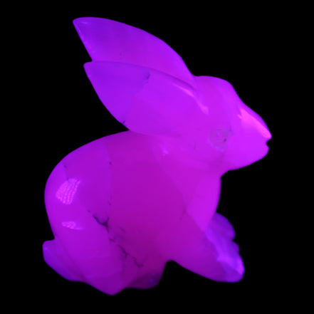 Mangano Calcite bunny 76*36*100mm 396g in UV light - Rocks and Things Store