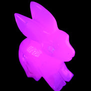 Mangano Calcite bunny 76*36*100mm 396g in UV light - Rocks and Things Store