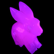 Mangano Calcite bunny 76*36*100mm 396g in UV light - Rocks and Things Store