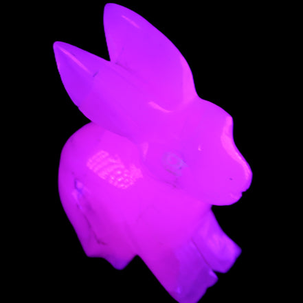 Mangano Calcite bunny 76*36*100mm 396g in UV light - Rocks and Things Store