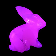 Mangano Calcite bunny 76*36*100mm 396g in UV light - Rocks and Things Store