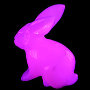 Mangano Calcite bunny 76*36*100mm 396g in UV light - Rocks and Things Store