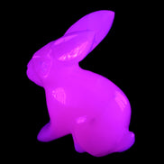 Mangano Calcite bunny 76*36*100mm 396g in UV light - Rocks and Things Store