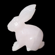 Mangano Calcite bunny 76*36*100mm 396g in sunlight - Rocks and Things Store