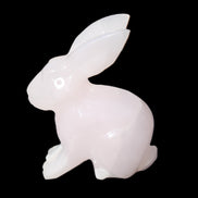 Mangano Calcite bunny 76*36*100mm 396g in sunlight - Rocks and Things Store