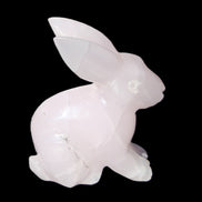 Mangano Calcite bunny 76*36*100mm 396g in sunlight - Rocks and Things Store