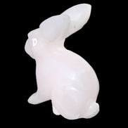 Mangano Calcite bunny 76*36*100mm 396g in sunlight - Rocks and Things Store