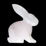Mangano Calcite bunny 76*36*100mm 396g in sunlight - Rocks and Things Store