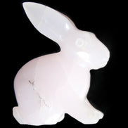 Mangano Calcite bunny 76*36*100mm 396g in sunlight - Rocks and Things Store