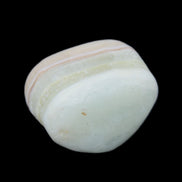 Pistachio Calcite tumbled stone 25-40mm 20-31g in sunlight - Rocks and Things Store