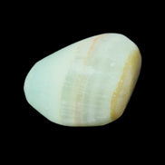 Pistachio Calcite tumbled stone 25-40mm 20-31g in sunlight - Rocks and Things Store