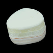 Pistachio Calcite tumbled stone 25-40mm 20-31g in sunlight - Rocks and Things Store