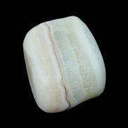 Pistachio Calcite tumbled stone 25-40mm 20-31g in sunlight - Rocks and Things Store