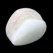 Pistachio Calcite tumbled stone 25-40mm 20-31g in sunlight - Rocks and Things Store