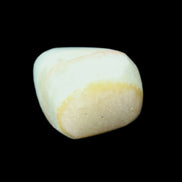 Pistachio Calcite tumbled stone 25-40mm 20-31g in sunlight - Rocks and Things Store
