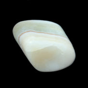 Pistachio Calcite tumbled stone 25-40mm 20-31g in sunlight - Rocks and Things Store