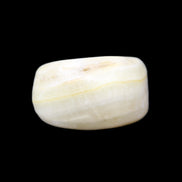 Pistachio Calcite tumbled stone 25-40mm 20-31g in sunlight - Rocks and Things Store