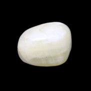 Pistachio Calcite tumbled stone 25-40mm 20-31g in sunlight - Rocks and Things Store