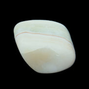 Pistachio Calcite tumbled stone 25-40mm 20-31g in sunlight - Rocks and Things Store