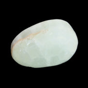 Pistachio Calcite tumbled stone 25-40mm 20-31g in sunlight - Rocks and Things Store