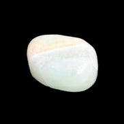 Pistachio Calcite tumbled stone 25-40mm 20-31g in sunlight - Rocks and Things Store