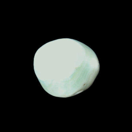 Pistachio Calcite tumbled stone 25-40mm 20-31g in sunlight - Rocks and Things Store