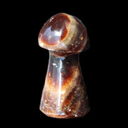 Chocolate Calcite Mushroom 32-35mm 14-18g in sunlight - Rocks and Things Store