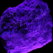 Magnificent Green Tourmaline, Kunzite, Lepidolite plus more specimen 140m 2035g in UV light - Rocks and Things Store