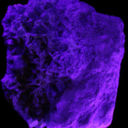 Magnificent Green Tourmaline, Kunzite, Lepidolite plus more specimen 140m 2035g in UV light - Rocks and Things Store