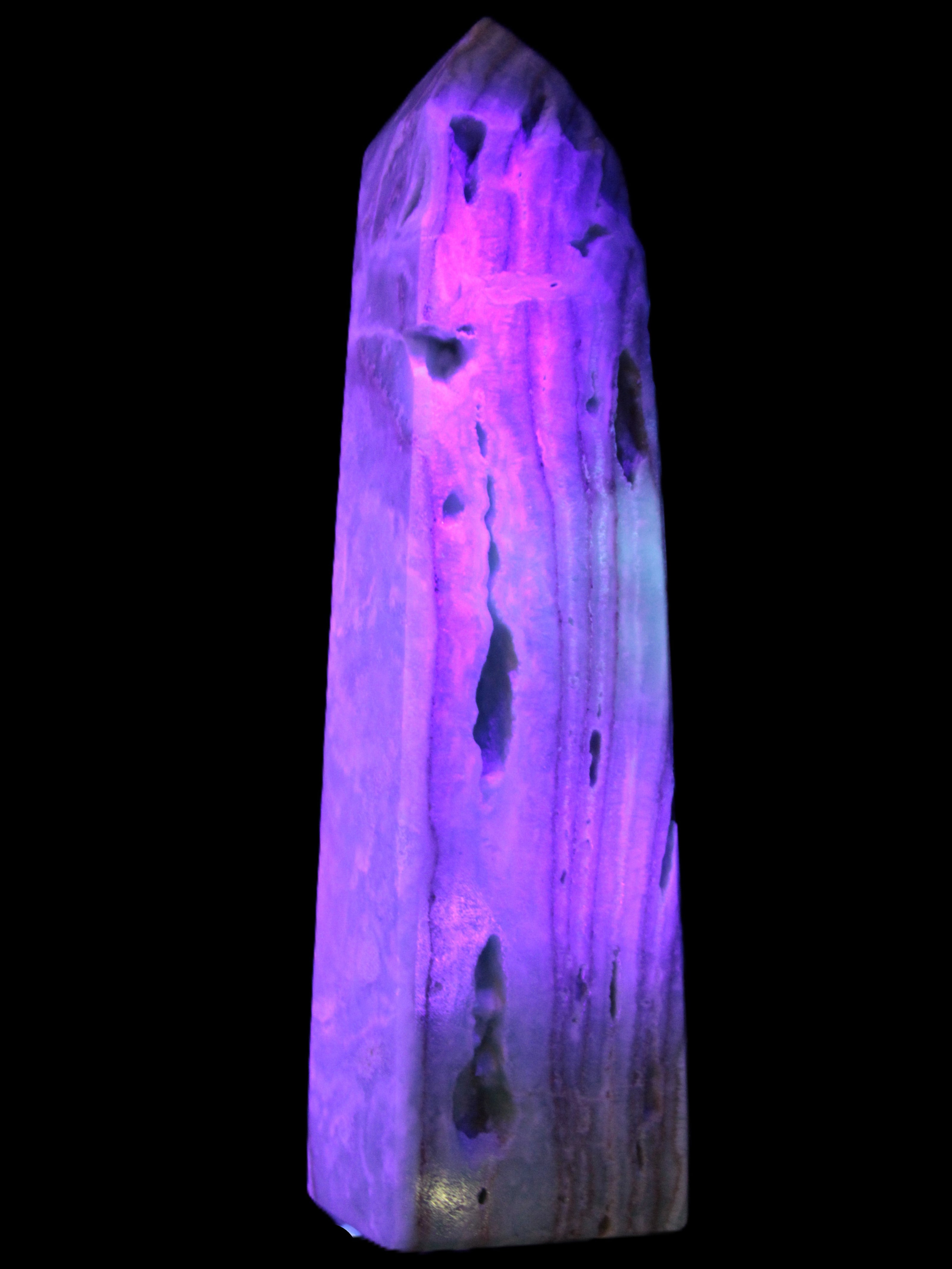 Caribbean Calcite aqua blue obelisk 170mm 539g in UV light - Rocks and Things Store