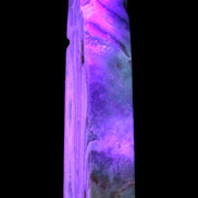 Caribbean Calcite aqua blue obelisk 170mm 539g in UV light - Rocks and Things Store